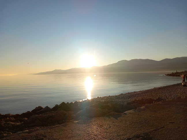 Zalazak s plaže kod Beach bara Morski prasac